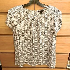 Banana Republic Factory s/s blouse with pleated jewel neck.  Gently worn.